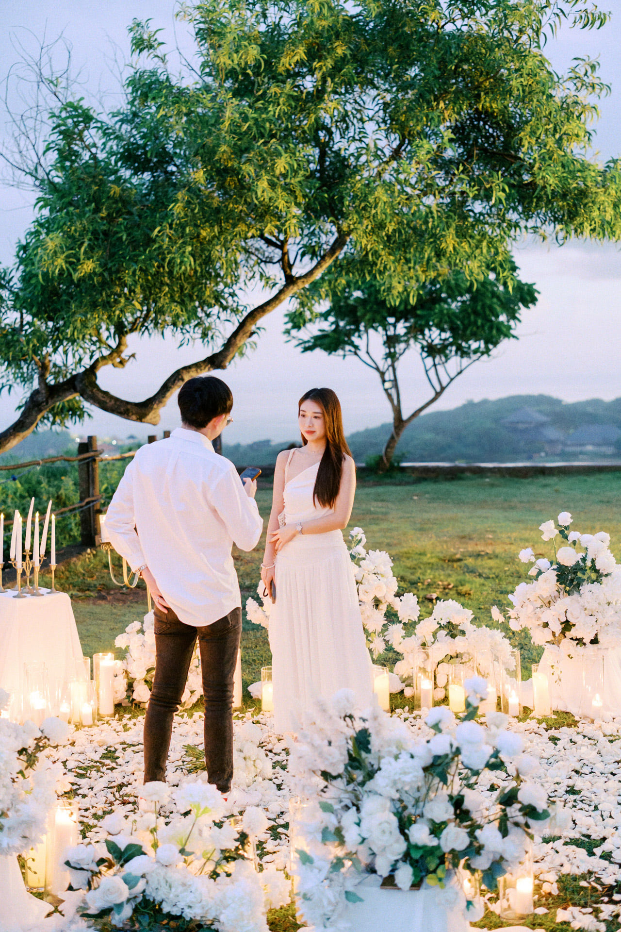 A Bali Proposal Surrounded by White Flowers 2 A Bali Proposal Surrounded by White Flowers 2